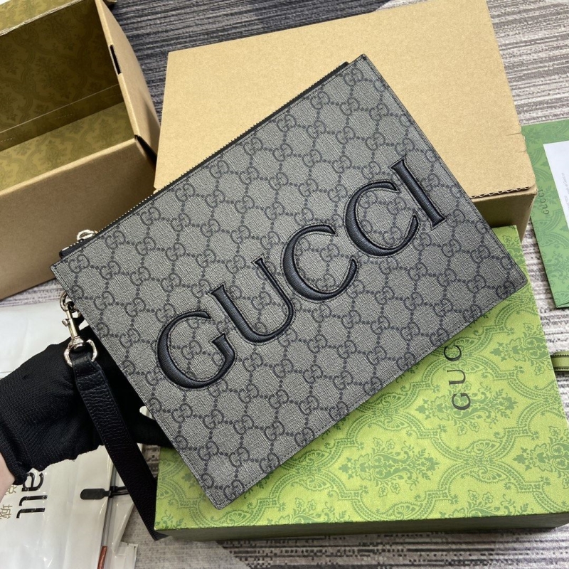 G*u*i clutch bags